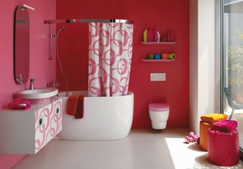 (via sweethomestyle) Or this bathroom, but not in pink! Maybe purple and orange? I’m digging that.